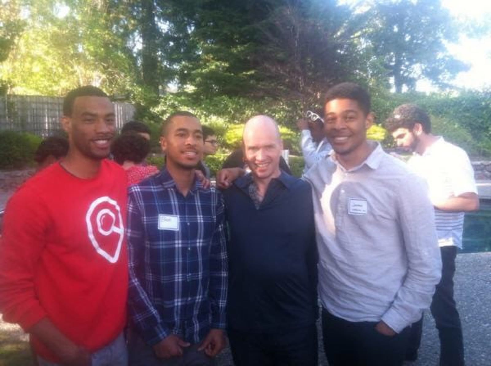 Ben Harvey in a group photo with investor Ben Horowitz at a Code2040 gathering in Silicon Valley